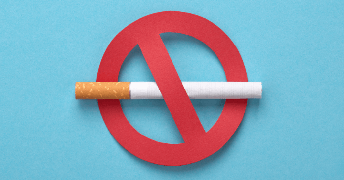 A symbol of a cigarette crossed out, representing the need to quit smoking for better oral health.