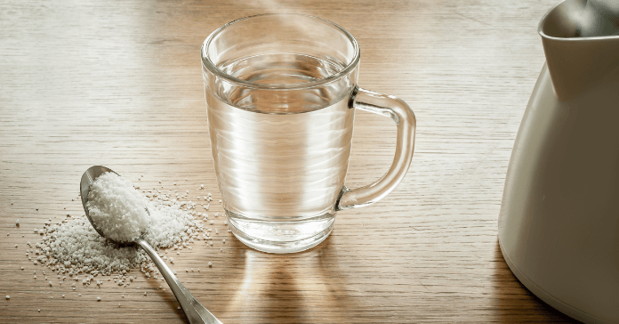 A saltwater rinse, one of the most common home remedies for a mouth abscess.